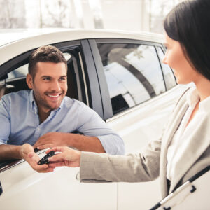 individual purchasing a vehicle from dealer