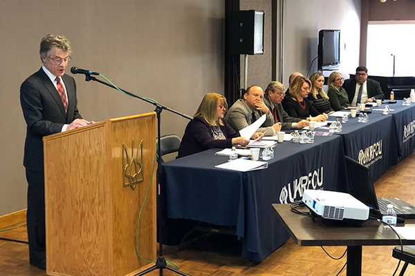 Ukrainian Selfreliance Federal Credit Union 2019 annual meeting with Chairmain, Roman Petyk and Board of Directors in background
