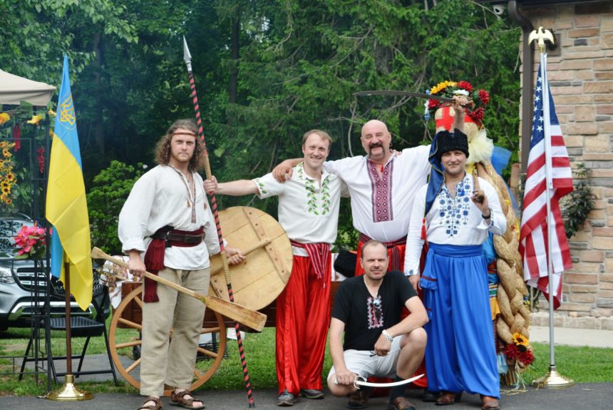 a group of ukrainians dressed in cultural attire in celebration of Mykhalivka festival